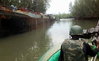 Oil theft: Navy destroys illegal refining site, wooden boat in Rivers