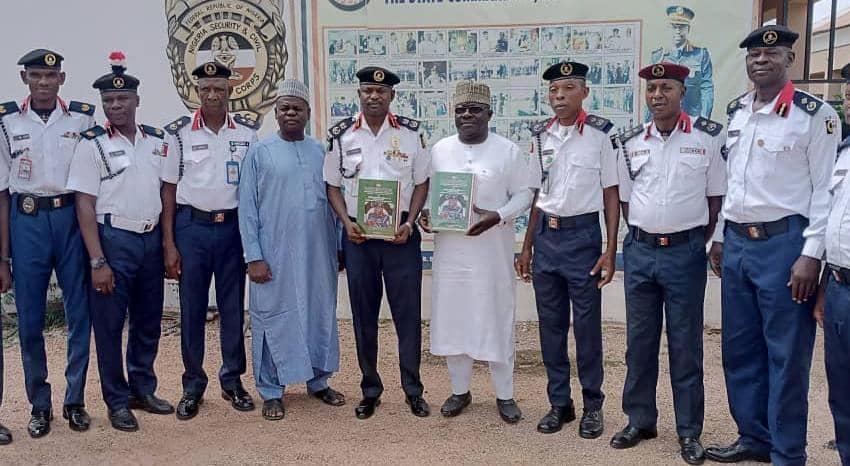 Kano NSCDC Personnel Receives CG Audi’s 3rd Year Compendium Of Achievements With Enthusiam, Its Commandant, Lawal Falala, Describes CG Audi As The Architect Of Modern Day NSCDC