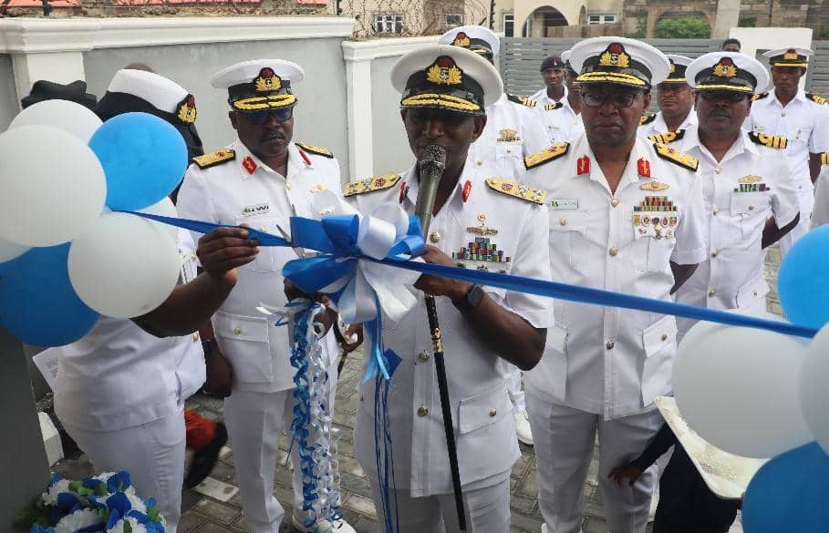 SUCCOUR FOR THE SLAIN AS THE CHIEF OF THE NAVAL STAFF PROVIDES BUNGALOW FOR WIDOW OF FALLEN HERO