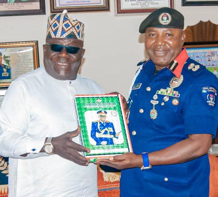 On The Plateau, Presenting CG Audi’s 4th Edition Of The Compendium Of Achievements To The Plateau NSCDC Indefatigable Commandant, Ishaku Musa, Says CG Audi Deserves More Time For Consolidating His Successes In Office
